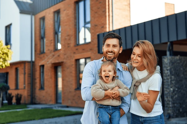Alberta family outside their home after window replacement
